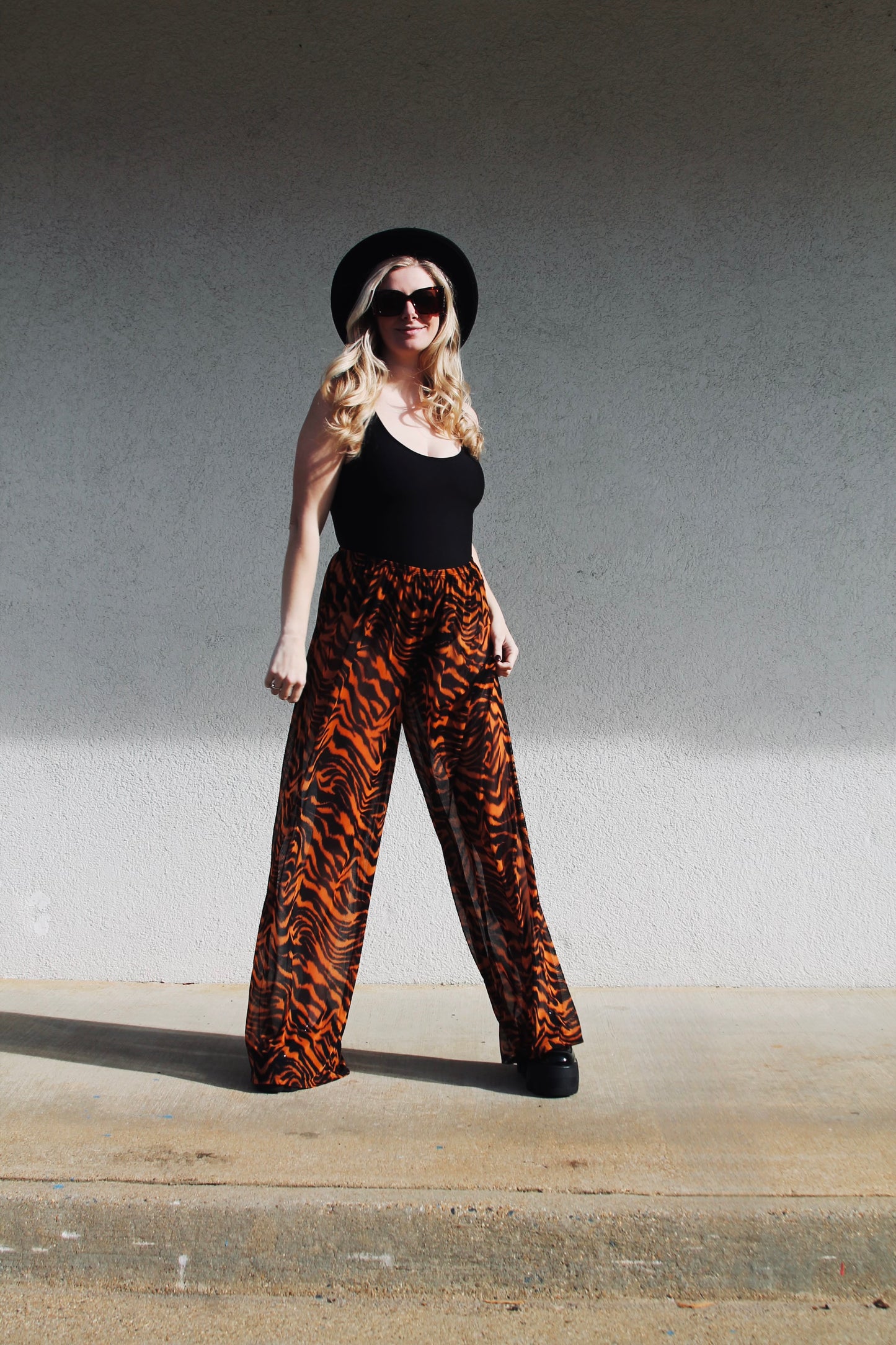 HEAR ME ROAR sheer tiger stripe trousers, medium