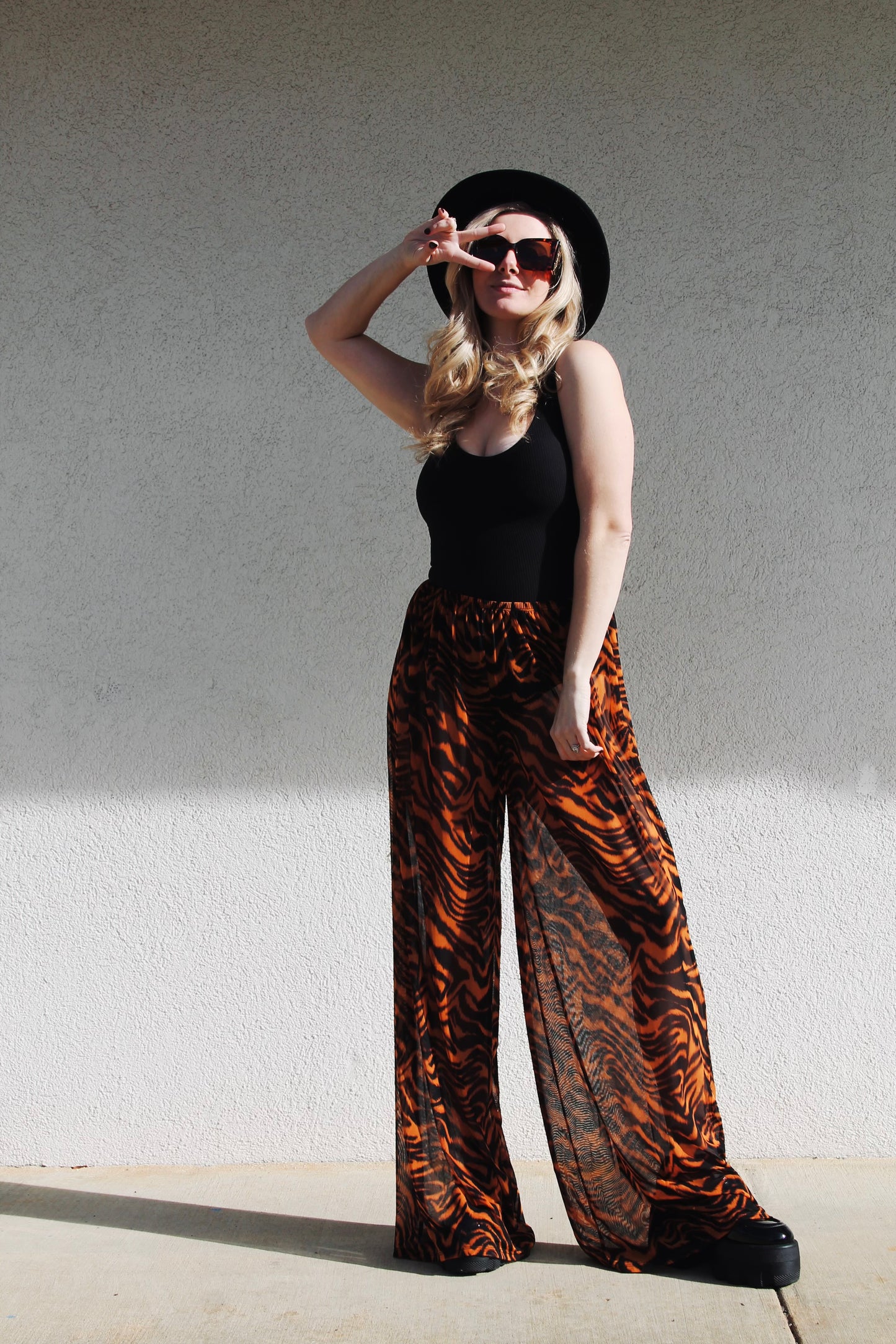 HEAR ME ROAR sheer tiger stripe trousers, medium