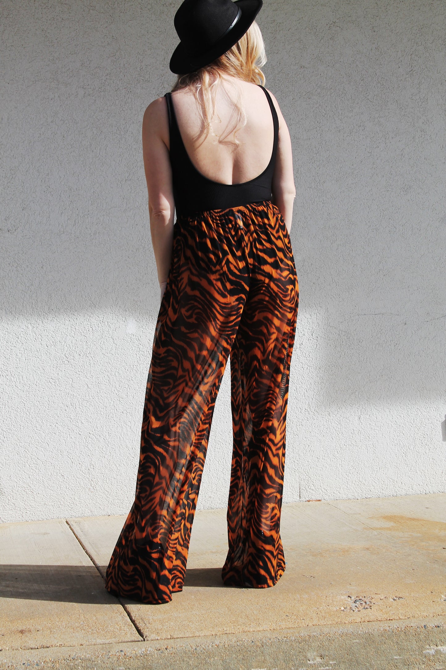 HEAR ME ROAR sheer tiger stripe trousers, medium