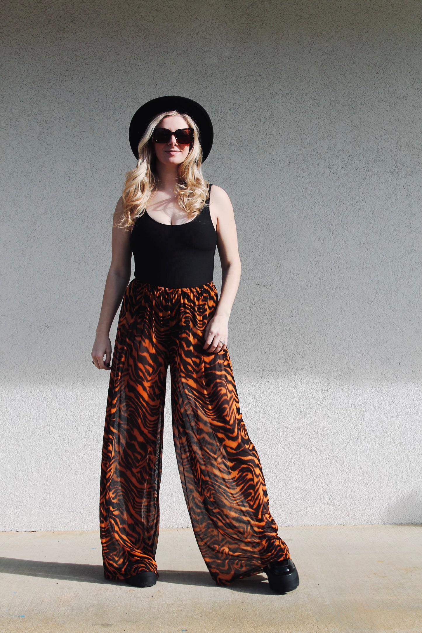 HEAR ME ROAR sheer tiger stripe trousers, medium