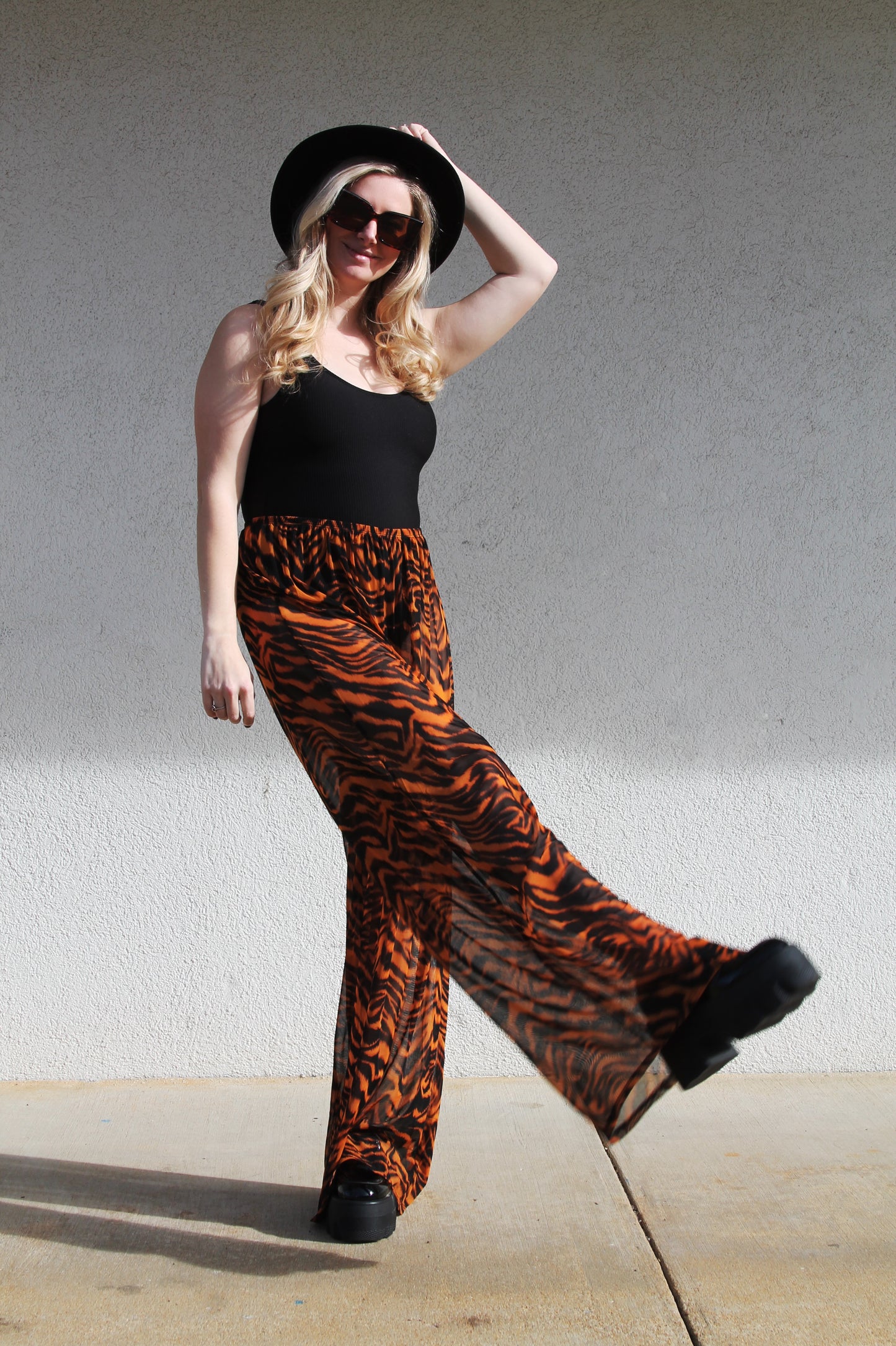 HEAR ME ROAR sheer tiger stripe trousers, medium